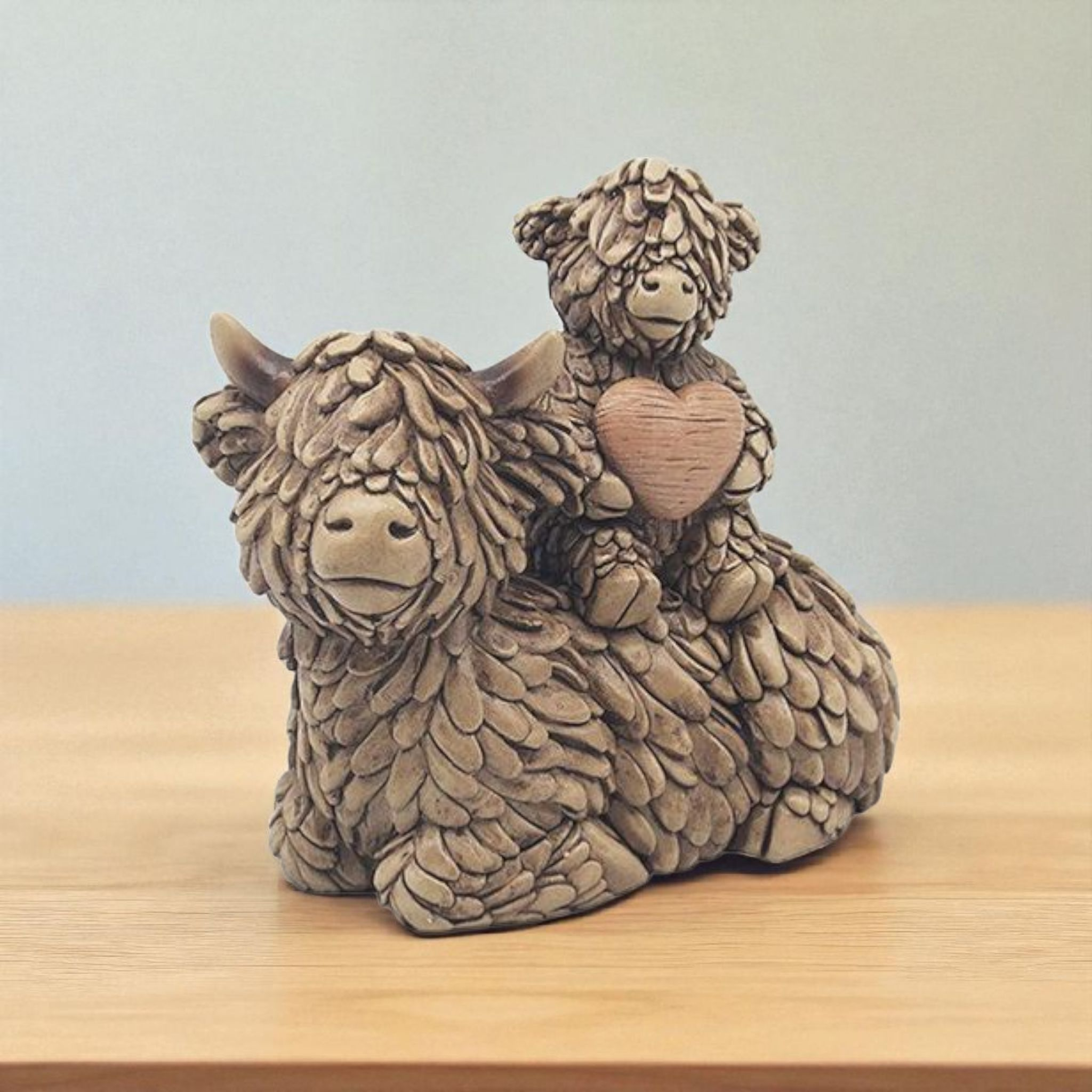 Hughie Highland Cow Heart Lying
