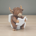 Highland Cow Reading On Toilet