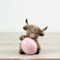 Highland Cow With Pink Easter Egg