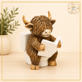 Highland Cow Reading On Toilet