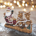 Gingerbread Santa On Sleigh With Two Reindeers