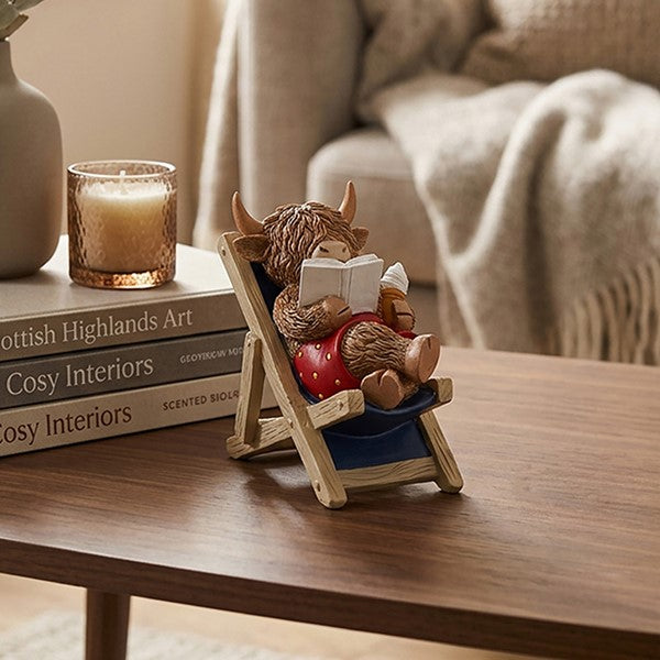 Highland Cow Reading in Deck Chair Ornament