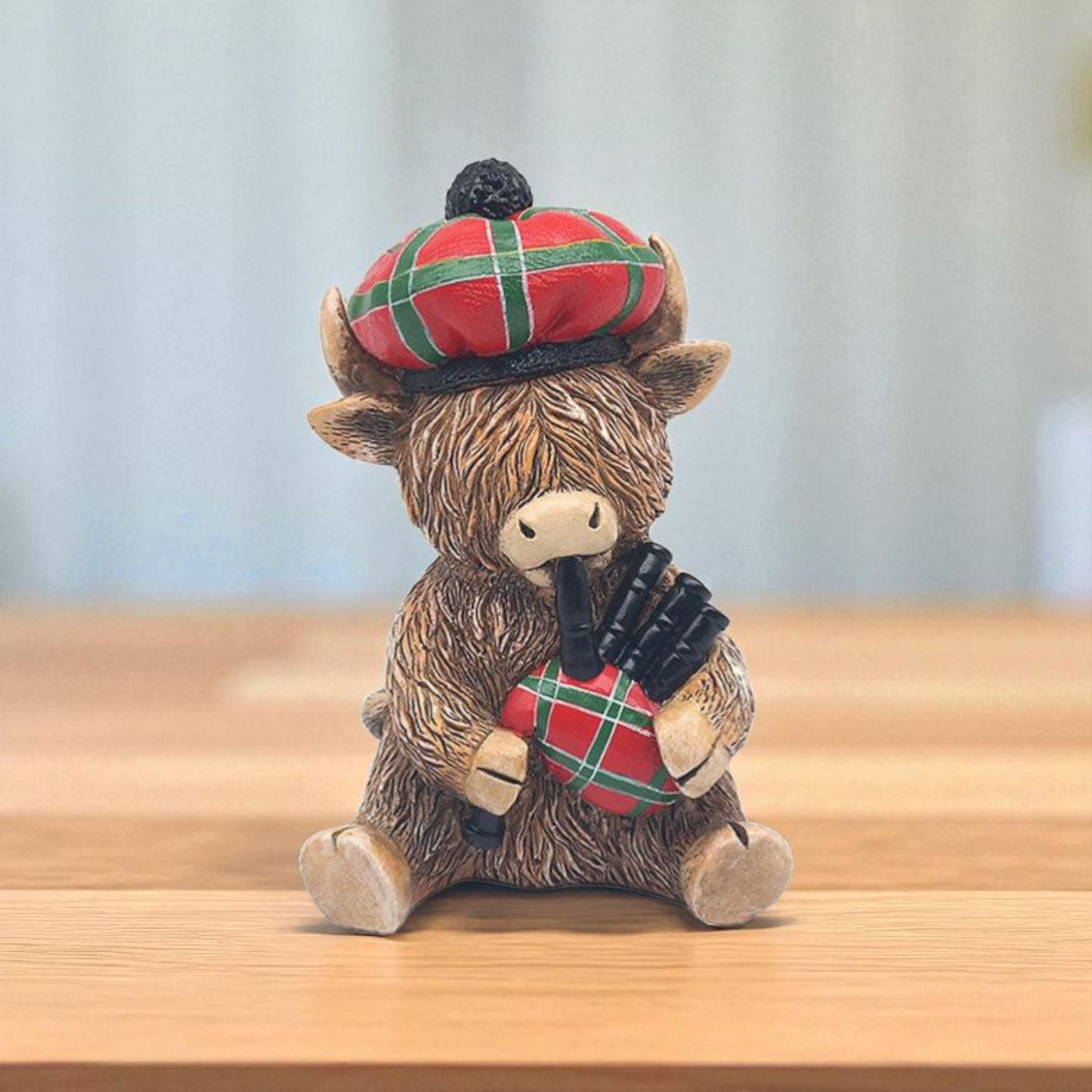 Highland Cow With Red & Green Tartan Hat & Bag Pipes