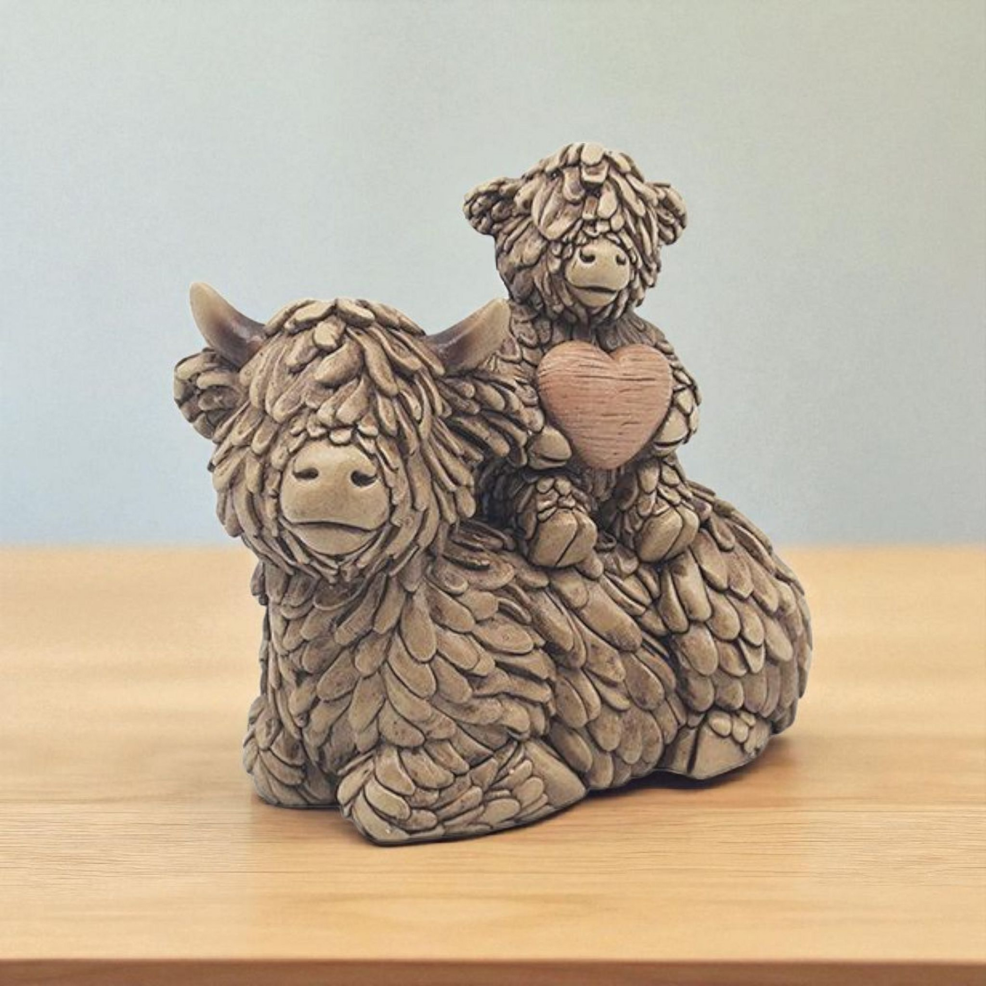 Hughie Highland Cow Heart Lying