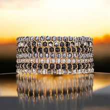 Load image into Gallery viewer, Venus Crystal Elasticated Bracelet - Gold &amp; Black
