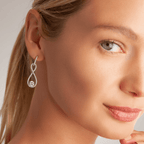 Vivienne Solitaire Twist Drop Earrings In White Gold & Cubic Zirconia