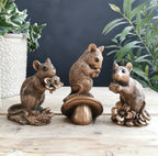 Bronze Mouse Holding Berry