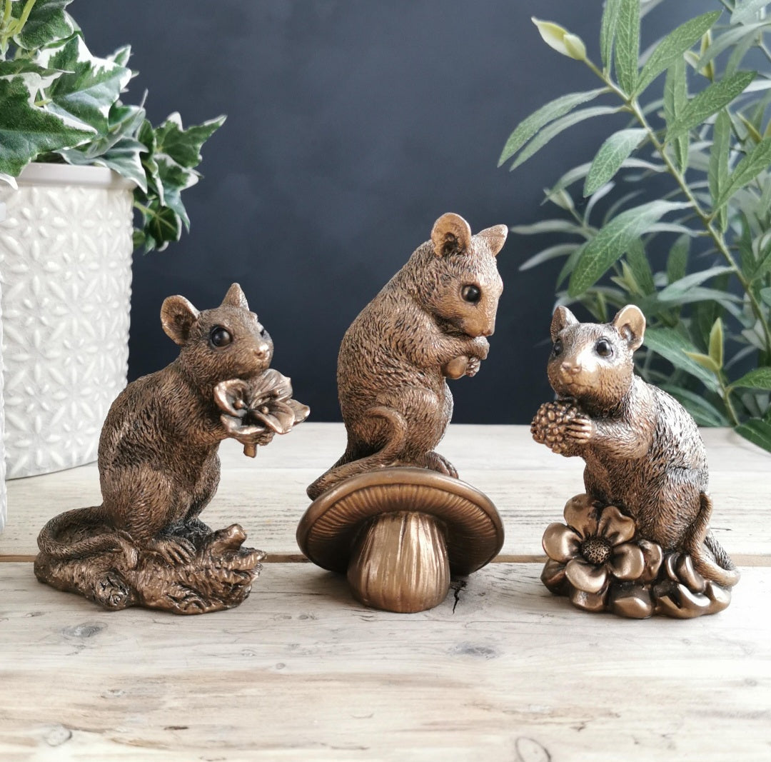 Bronze Mouse Holding Berry