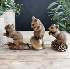 Bronze Mouse Holding Berry