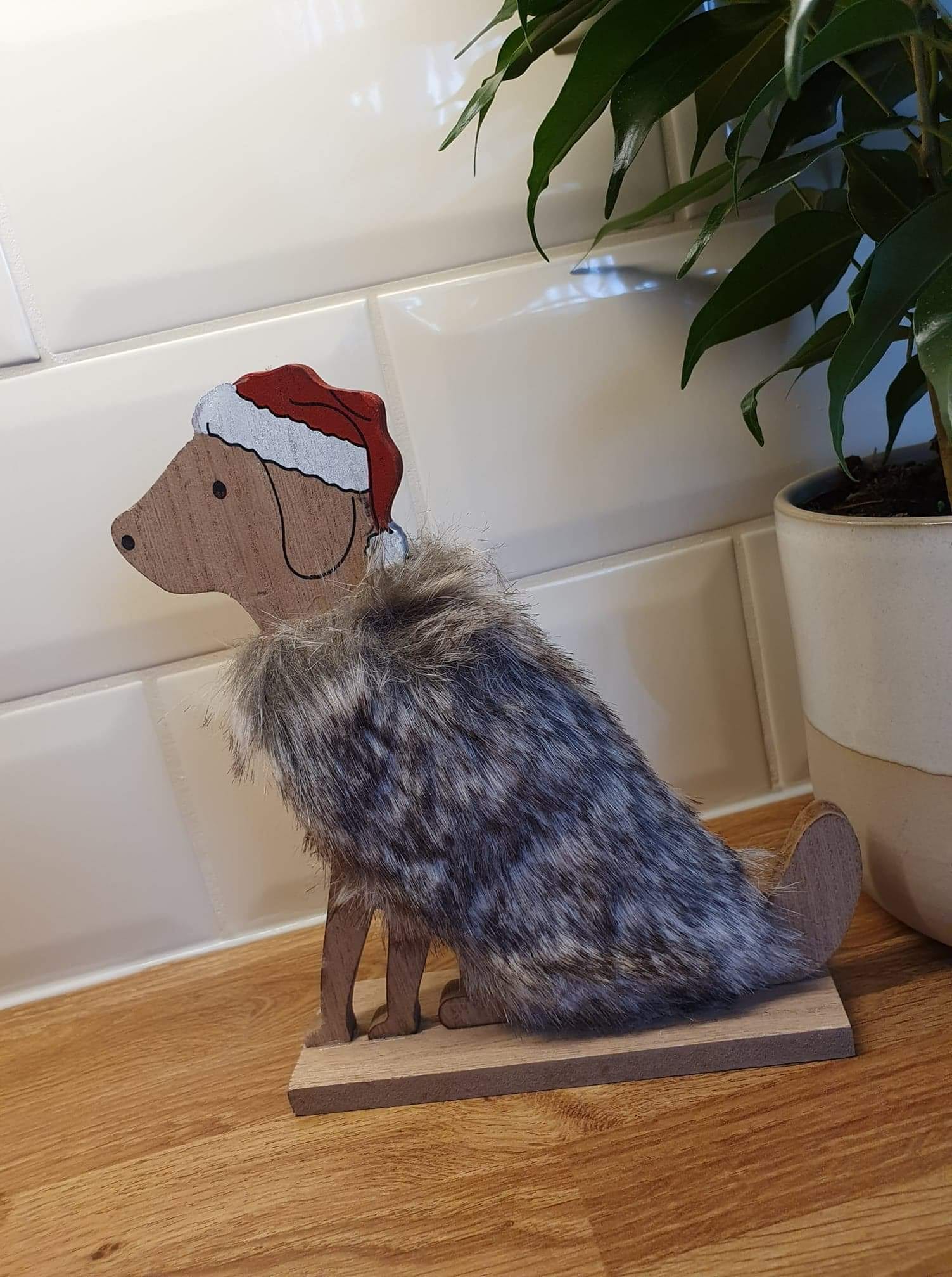 Fluffy Wooden Dog with Santa Hat