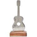 Silver Guitar On Wooden Base